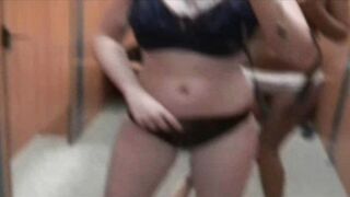 Changing room fun with her BFF