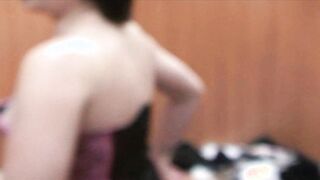 Changing room fun with her BFF