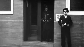 Charlie Chaplin - Easy Street - 1917