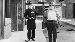Charlie Chaplin - Easy Street - 1917