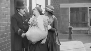 Charlie Chaplin - Easy Street - 1917