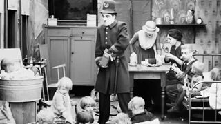 Charlie Chaplin - Easy Street - 1917