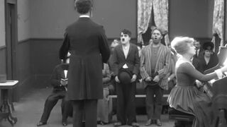 Charlie Chaplin - Easy Street - 1917