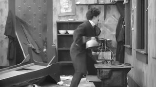 Charlie Chaplin - Easy Street - 1917