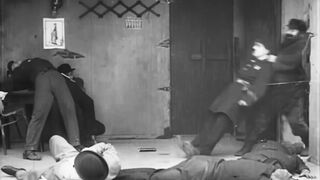 Charlie Chaplin - Easy Street - 1917
