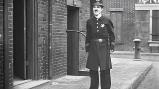 Charlie Chaplin - Easy Street - 1917